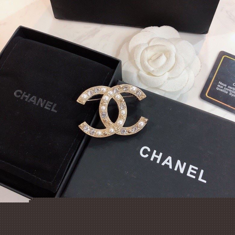 Ch*el brooches